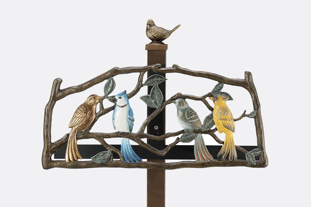 Hose Holder with birds on a white background.