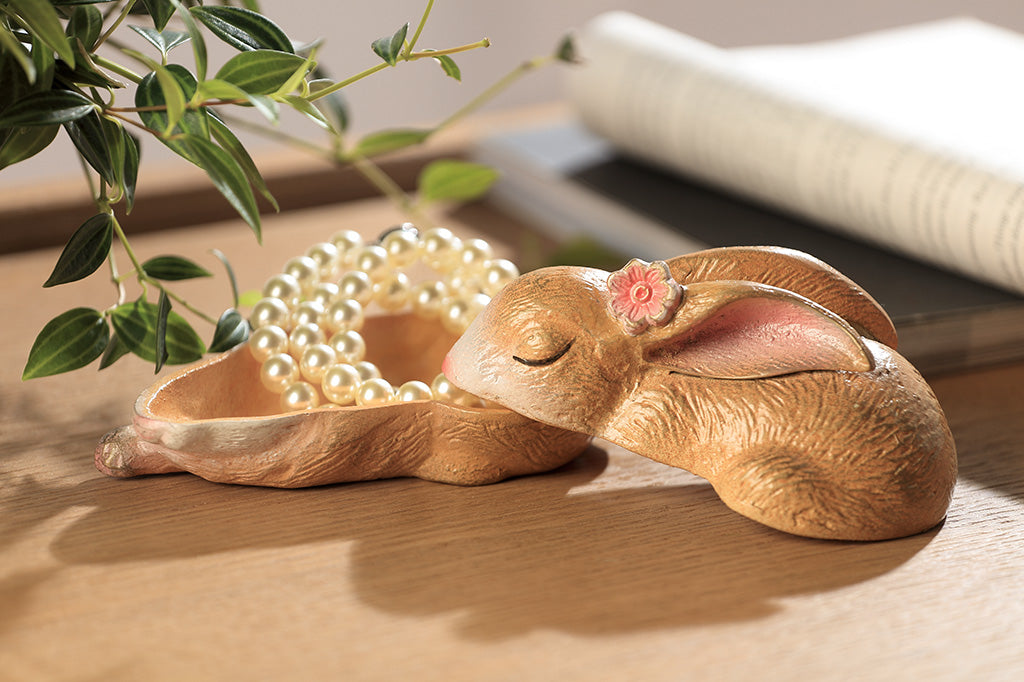 A sleeping bunny shaped keepsake box