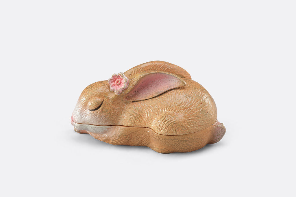 A sleeping bunny shaped keepsake box