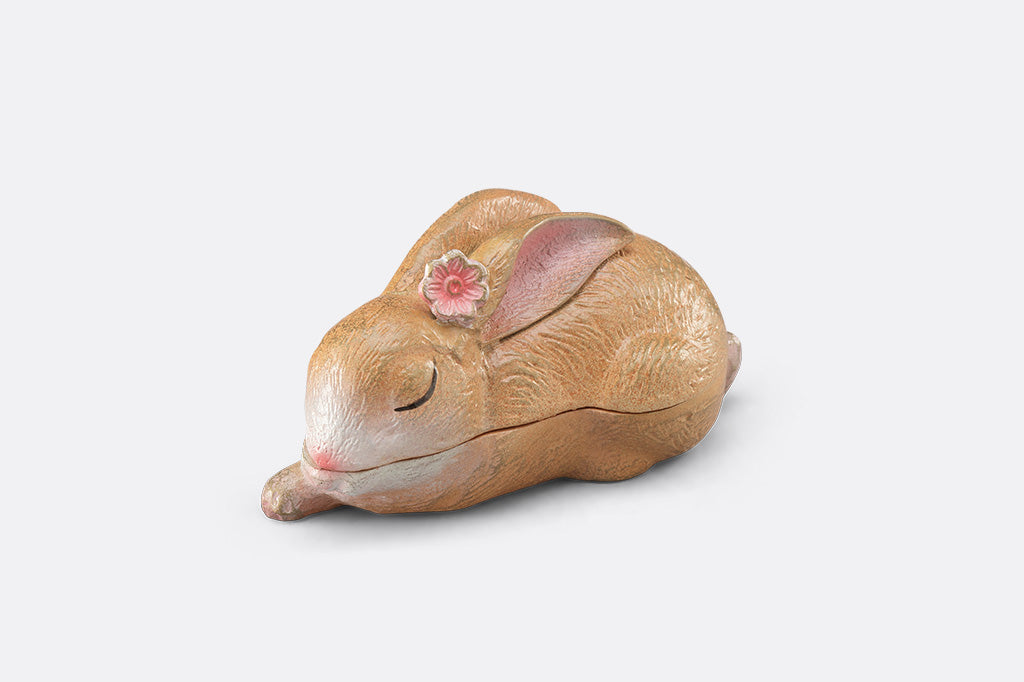 A sleeping bunny shaped keepsake box