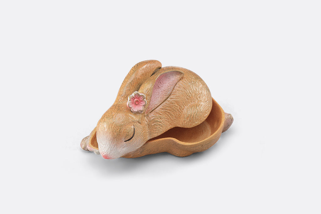 A sleeping bunny shaped keepsake box
