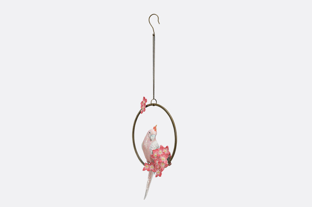 Decorative hanging sculpture with a bird and flowers