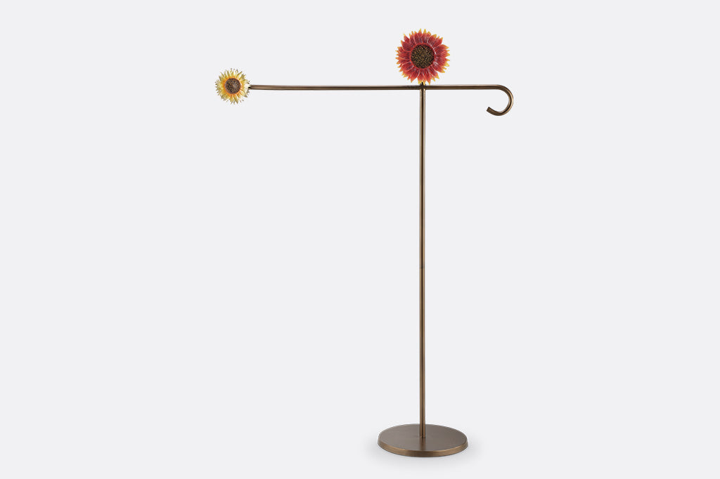 A flag stand of two sunflowers