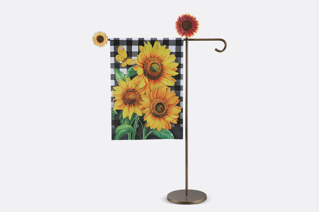 A flag stand of two sunflowers and a sunflower flag