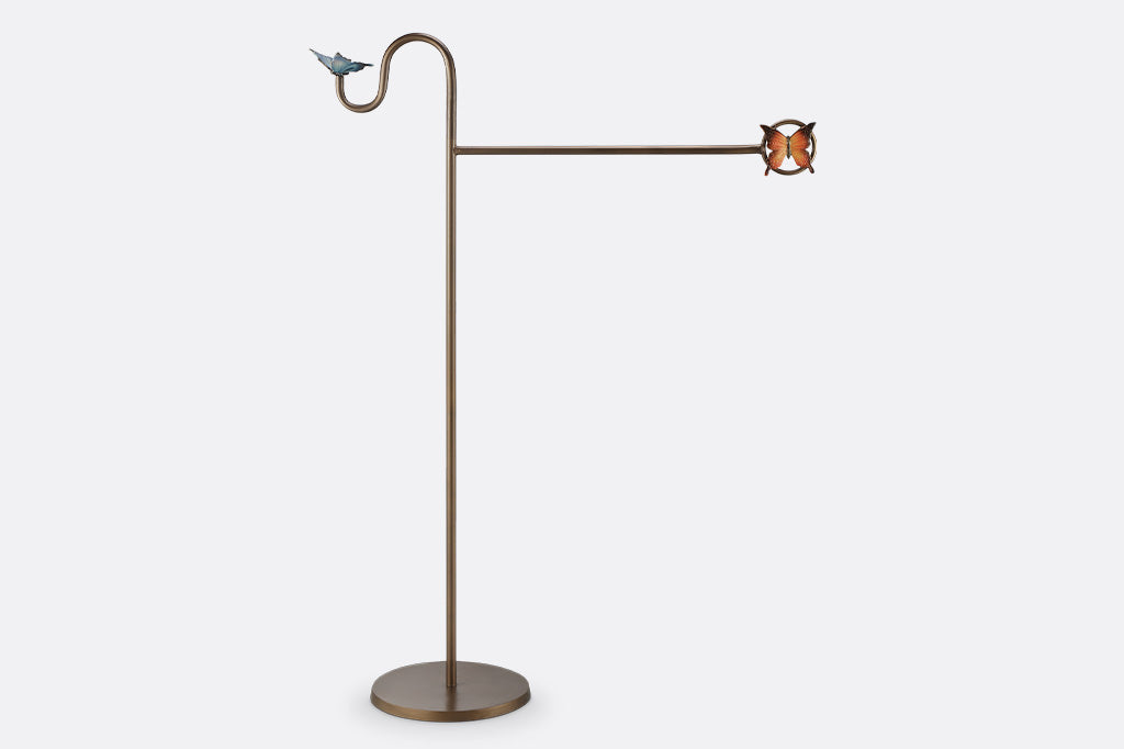 A flag stand with two butterflies