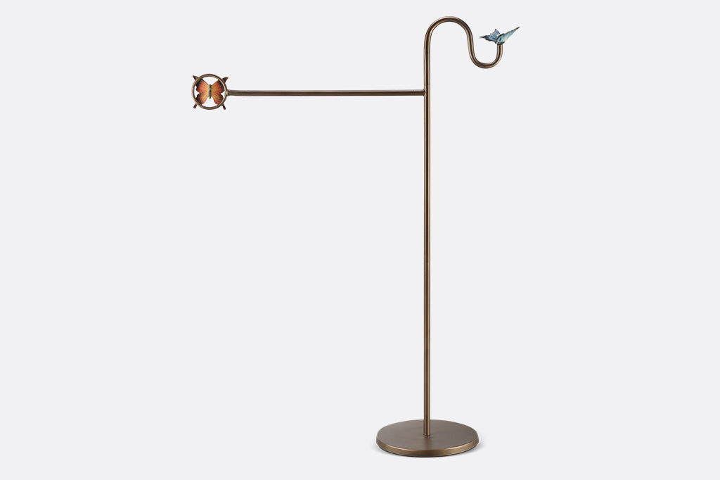 A flag stand with two butterflies