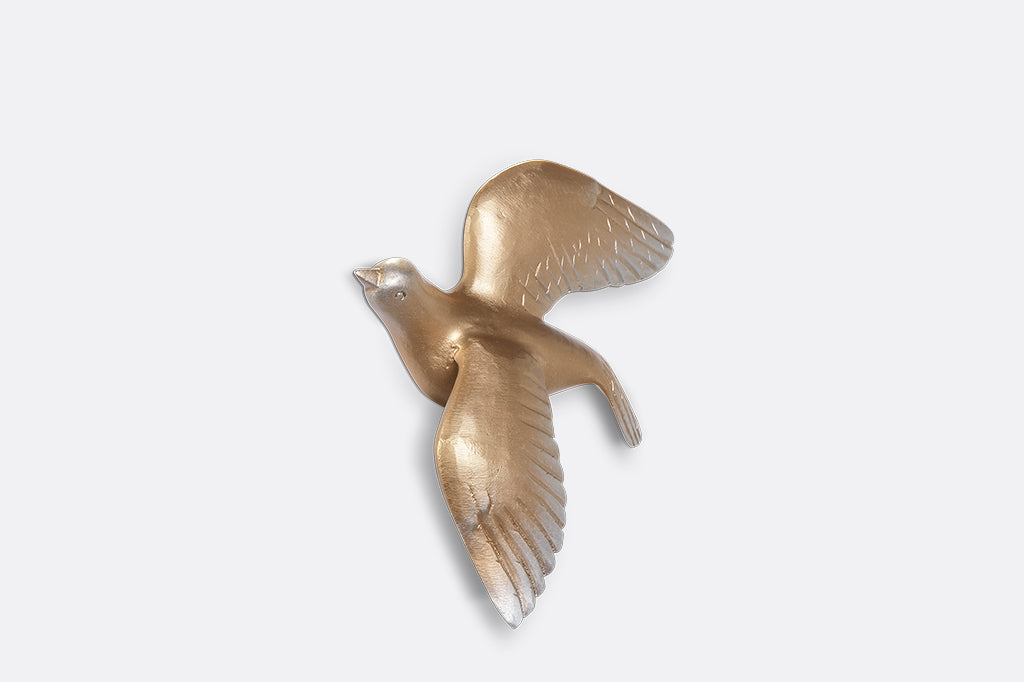 A set of 5 gold birds posed in flight.