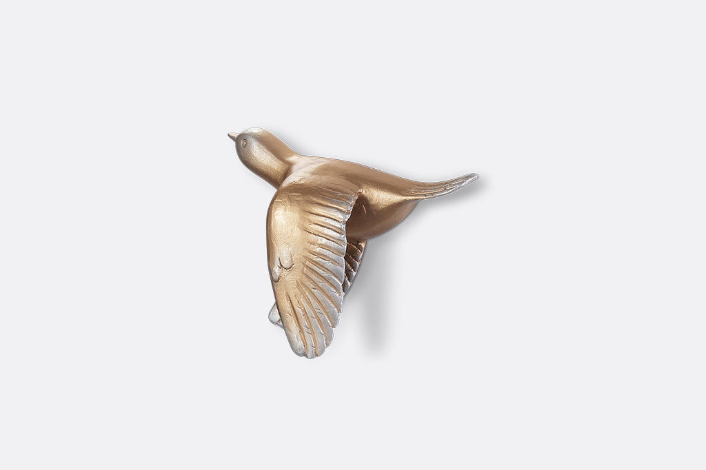 A set of 5 gold birds posed in flight.