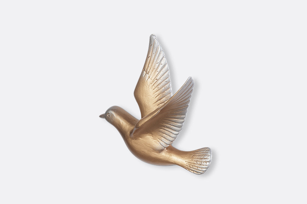 A set of 5 gold birds posed in flight.