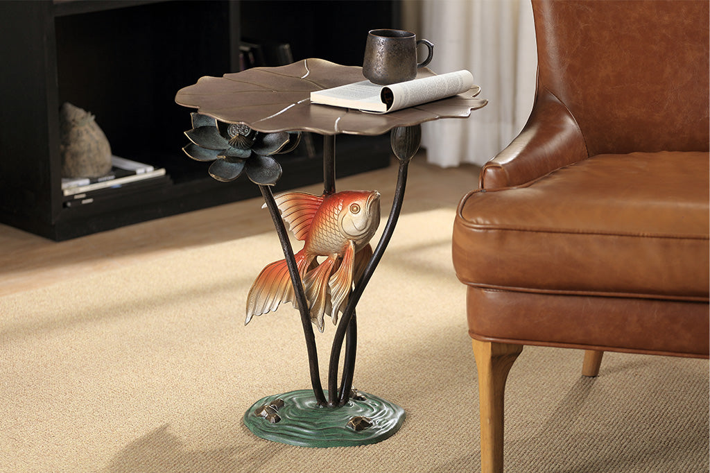 Decorative side table with koi fish design in a living room setting
