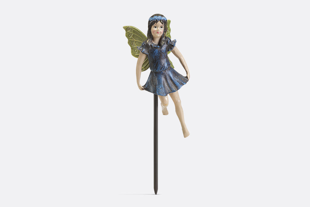 A plant pot stake sculpture of a fairy wearing blue.