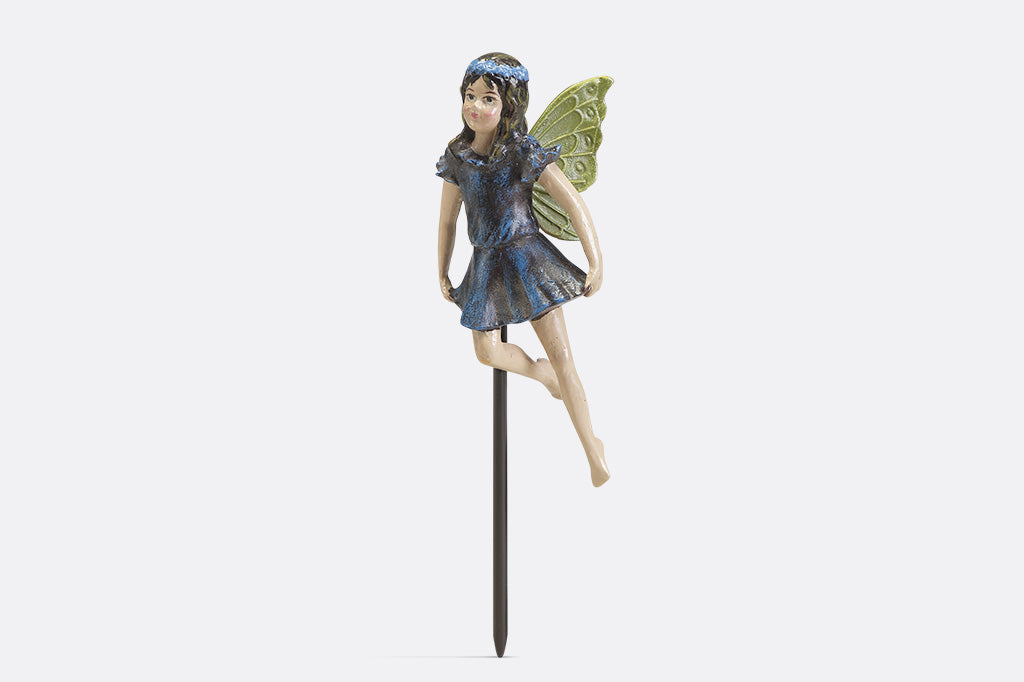 A plant pot stake sculpture of a fairy wearing blue.