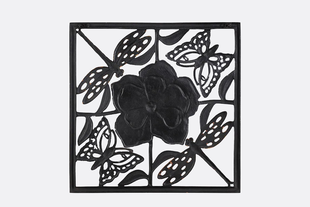 Back view of Decorative metal panel with floral and butterfly design on a white background