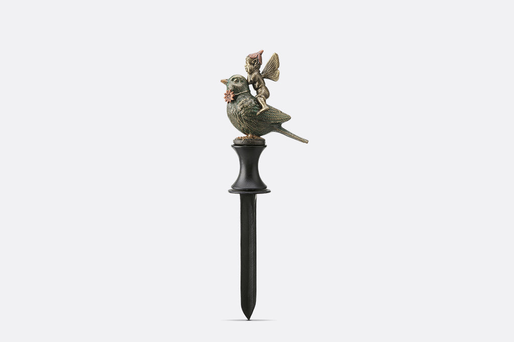 hoseguard with fairy on bird on a white background