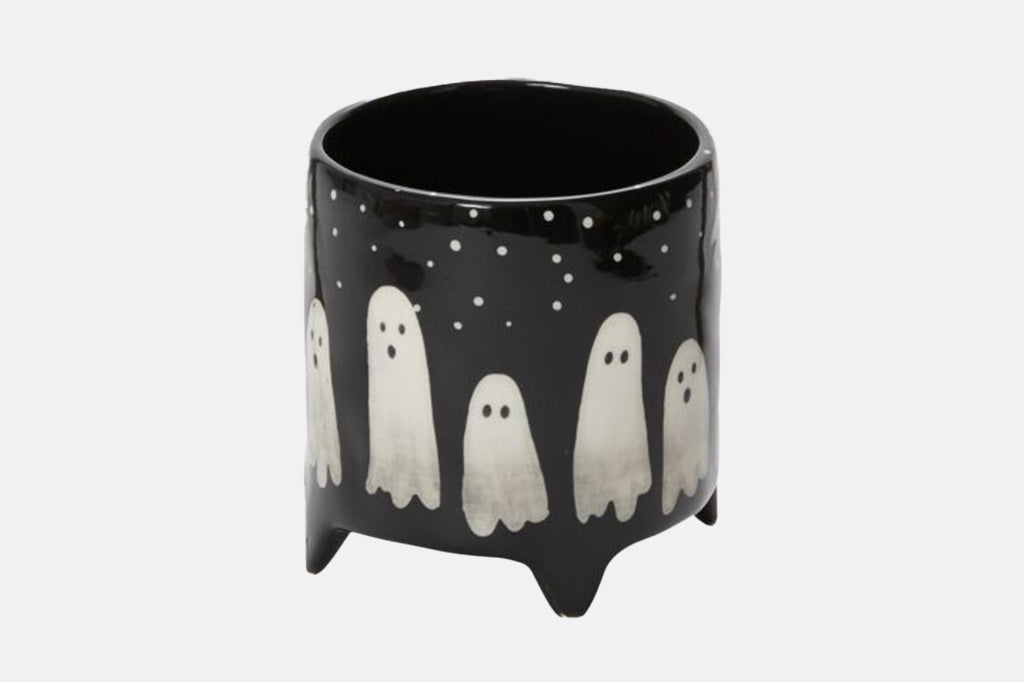 Black pot with ghost designs all around, ceramic planter pot