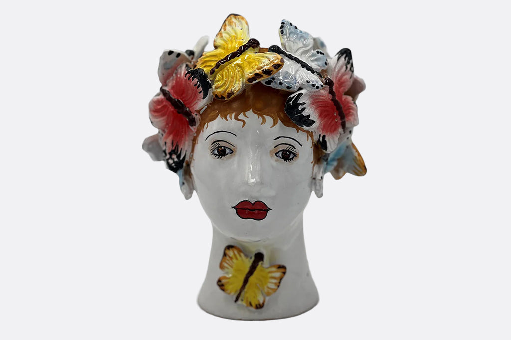 handmade ceramic female head adorned with butterflies vase