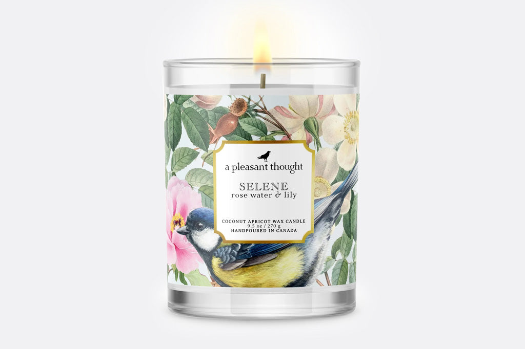 Selene rose water and lily scented candle with bird and blossom design on glass vessel