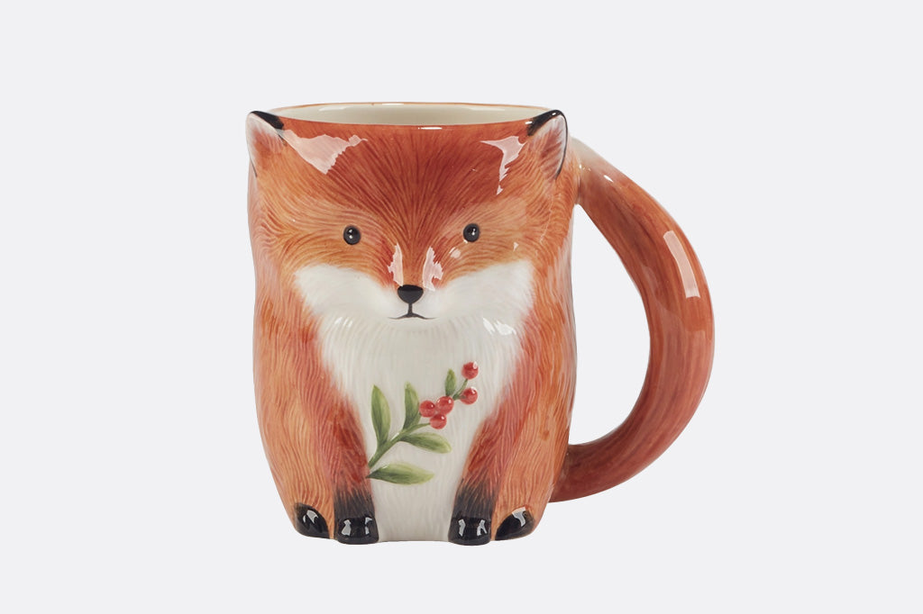 Fox-shaped mug with a white background