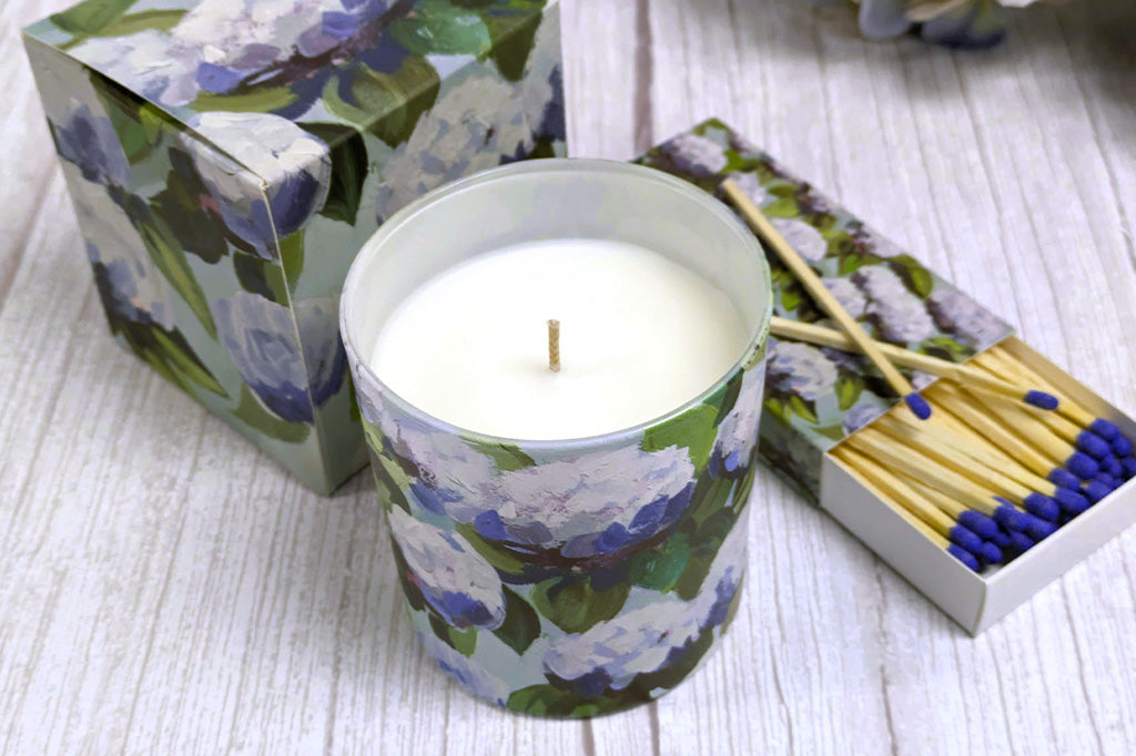 decorative box and candle shown with decorative box of matches in a hydrangea print theme