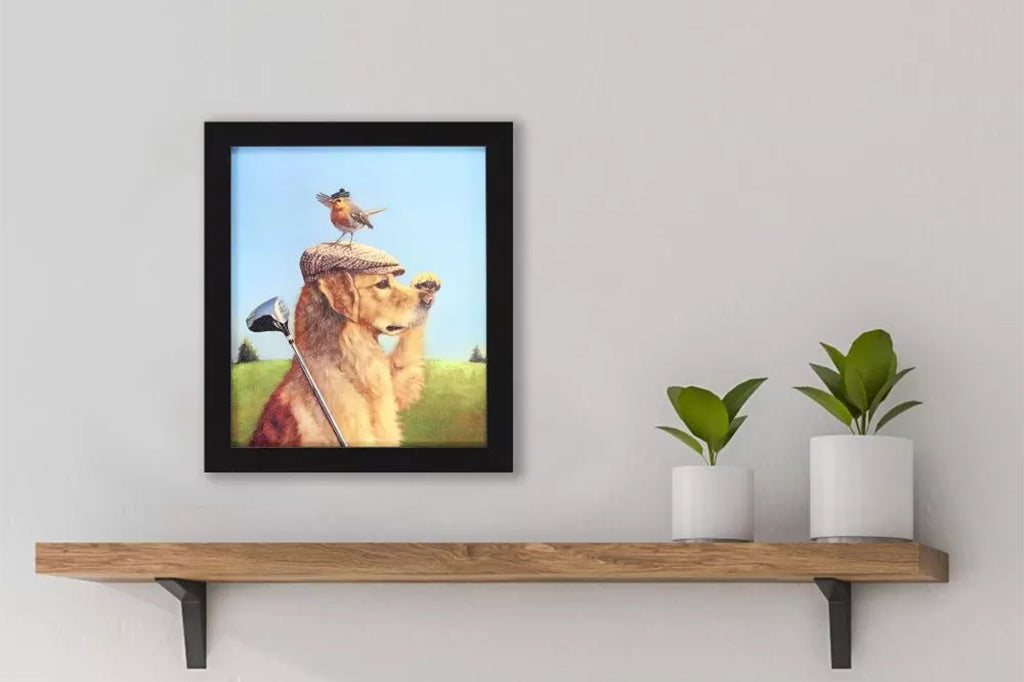 Framed artwork of a dog with a golf club and a bird on its head.