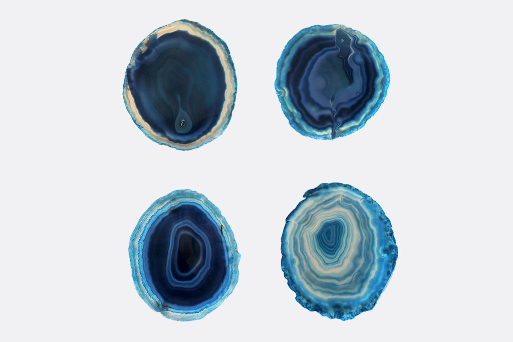 Set of four blue crystal coaster, different swirl patterns #color_teal