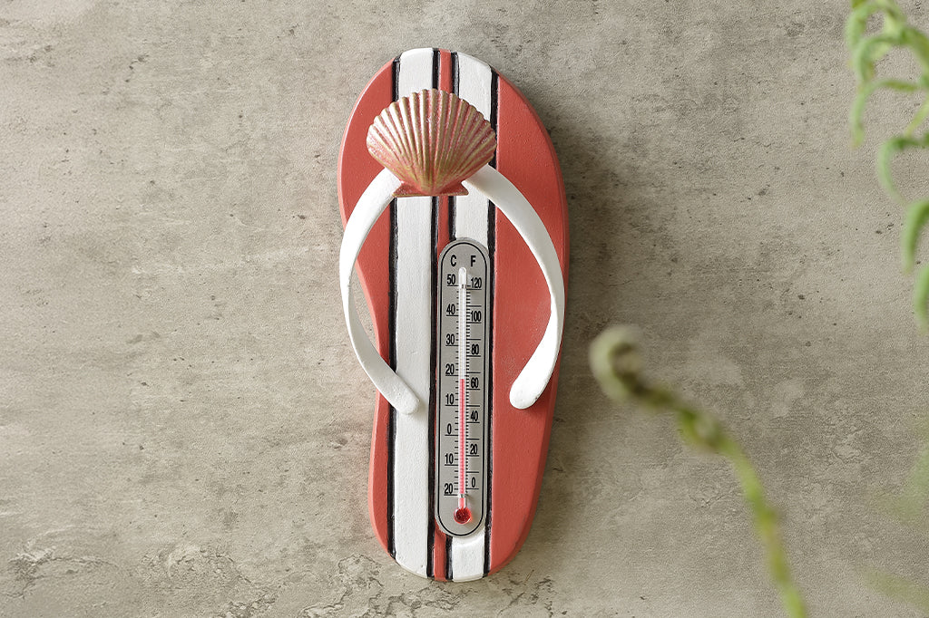 orange flip flop shaped wall hook and thermometer with orange and gold shell detail #color_melon