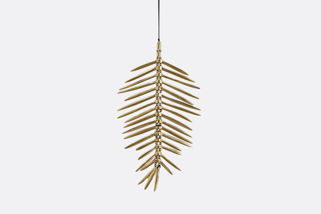 Metal wind art in shape of leaf medium size