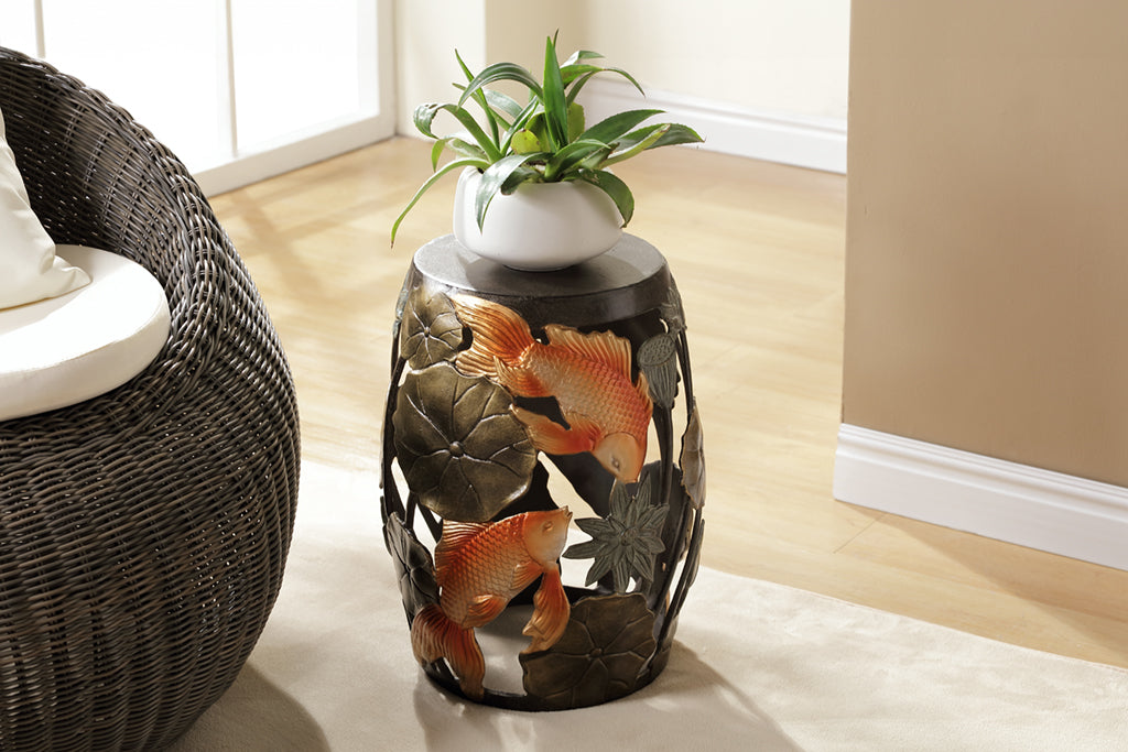 Cast Metal koi fish and water lily garden/ accent stool. golden orange koi surrounded by bronze water lilypad motifs.