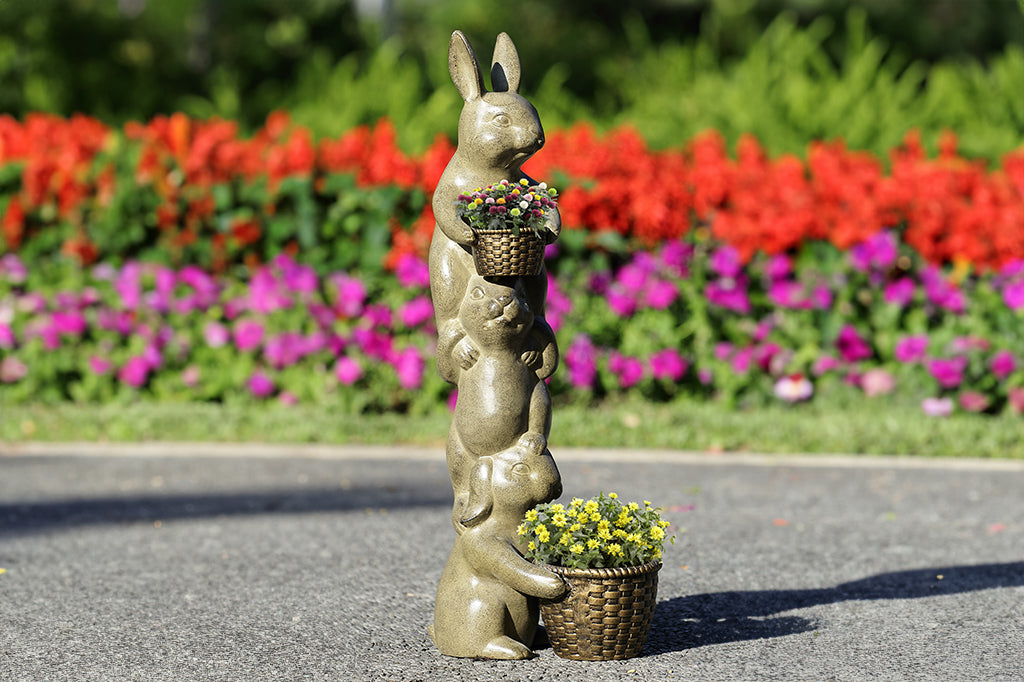 cast metal trio bunny stacked planter with two planters. one at base of sculpture the other in the paws on top bunny