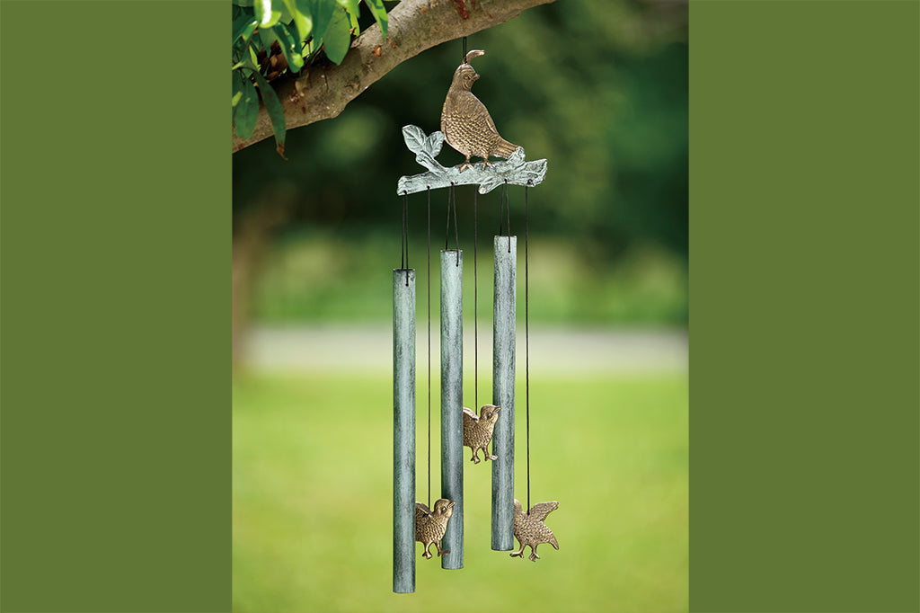 Cast metal quail windchime set on tree