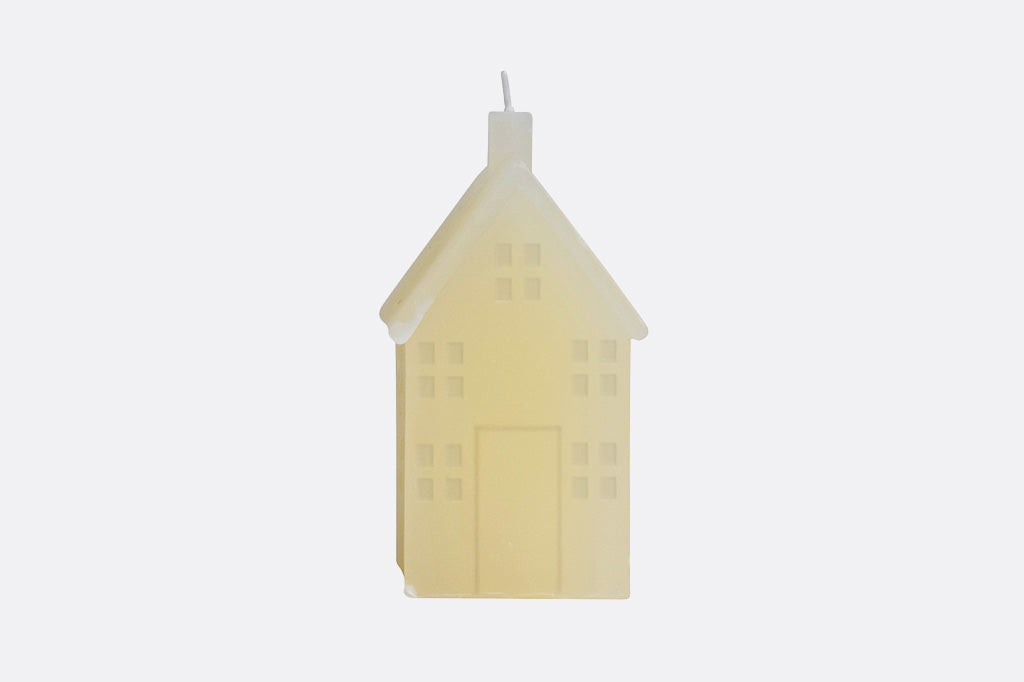 holiday village/home candle in eggnog with small window and door detail  