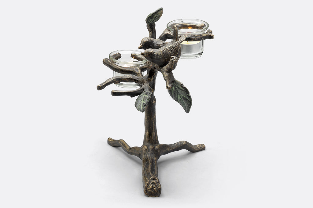 small bird and branch table candelabra with 2 birds, holds 3 tealights in glass cups - side view of green leaves and birds