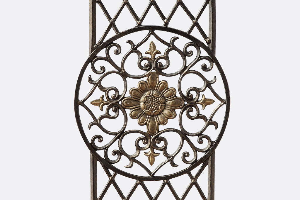 garden trellis with center sunflower medallion motif, surrounded by latice fretwork