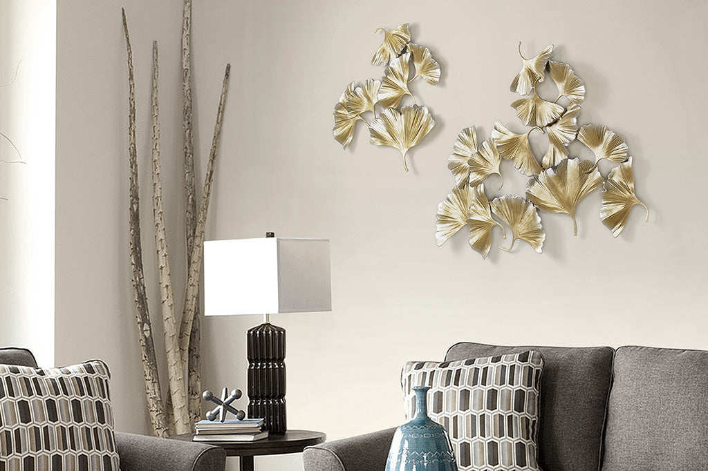 Two ginkgo wall art sculptures shown together