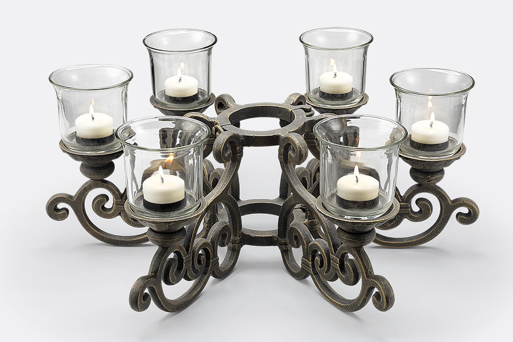 cast metal candelabra with candles