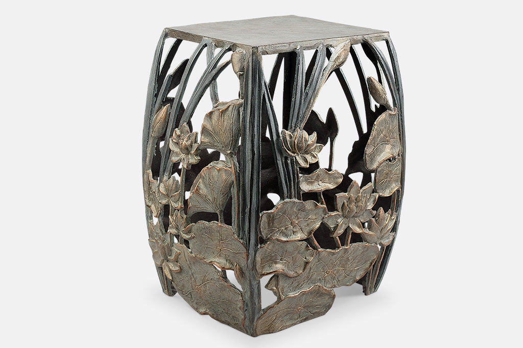 cast metal lotus flowers and cattails squared garden stool, floral design on all four panels of stool