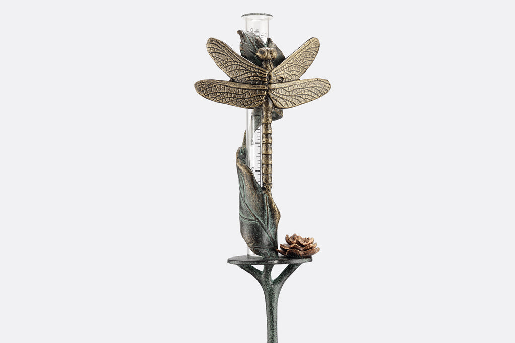 dragonfly sculpted motif on rain catcher, small leaf and blossom accents