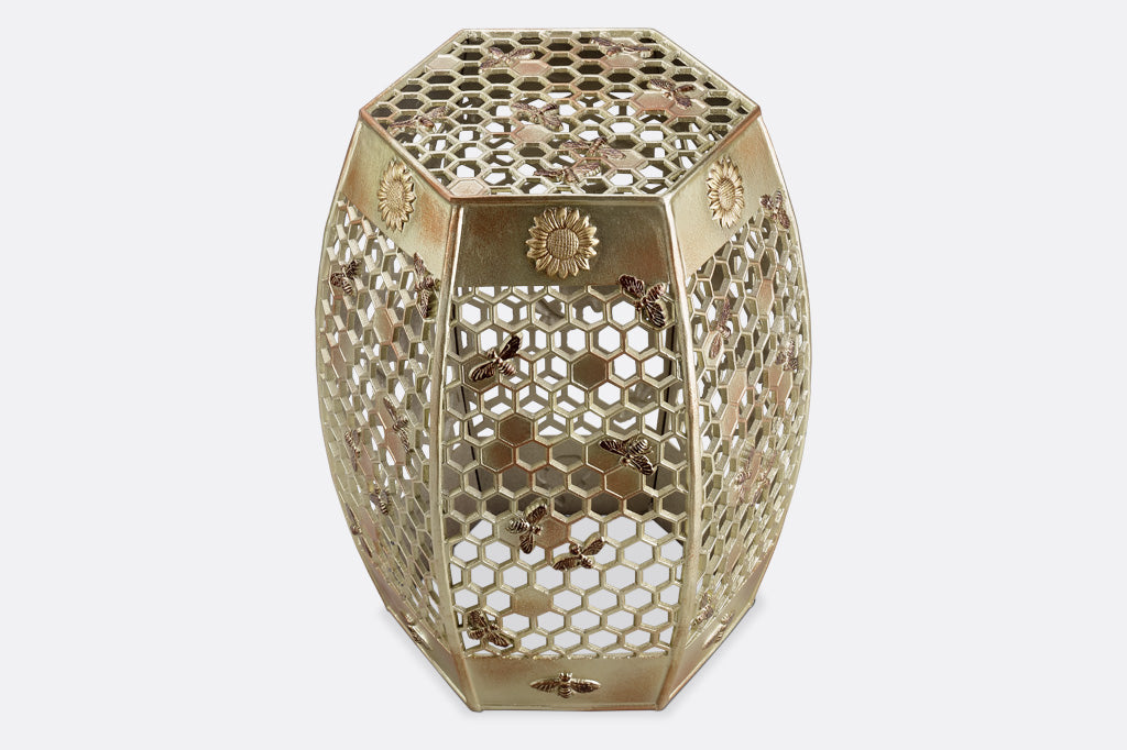 6 sided golden garden stool features honeycomb design with golden bees and sunflower medallions