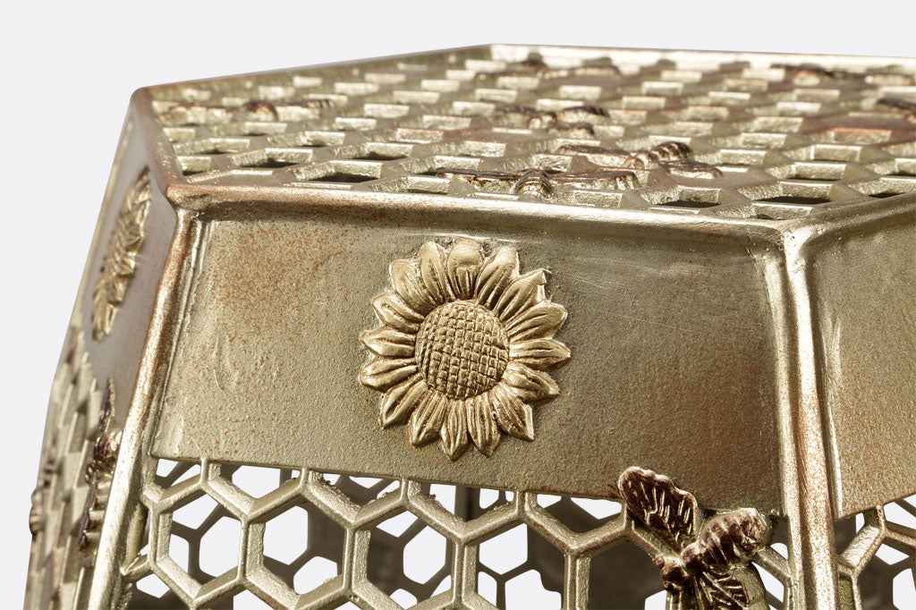 close up of sunflower motif on the All Abuzz Garden Stool