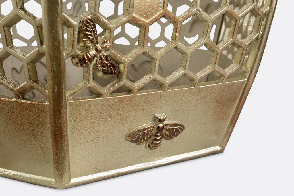close up of honeybee motif on the All Abuzz Garden Stool