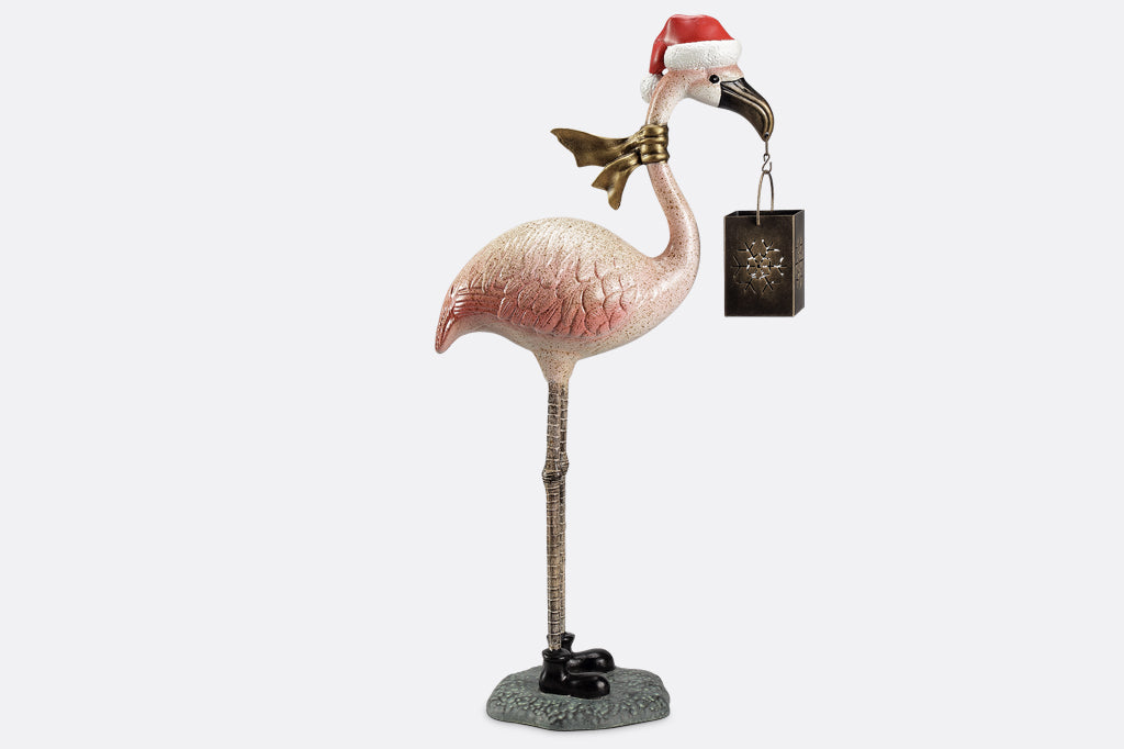 animation of all angles of a santa-themed holiday flamingo garden lantern