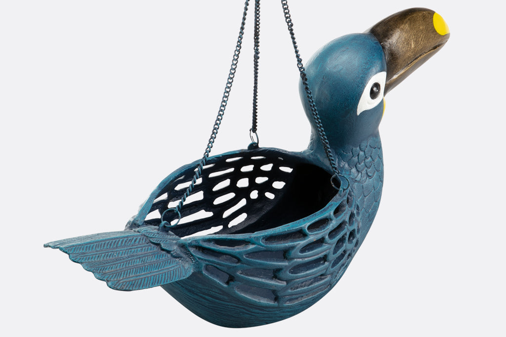 Back view of cast metal toucan hanging planter, blue toucan with gold and yellow beak.
