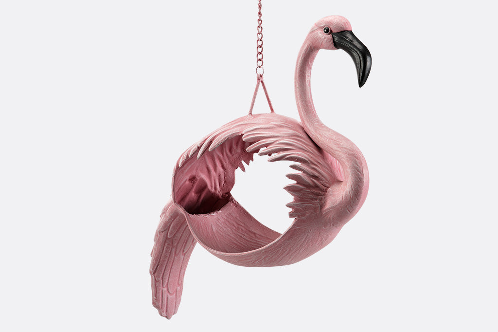 hanging planter designed for plants to be inserted into a flamingo shaped body
