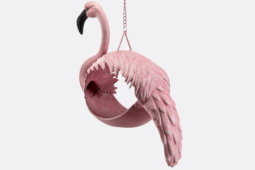hanging planter designed for plants to be inserted into a flamingo shaped body