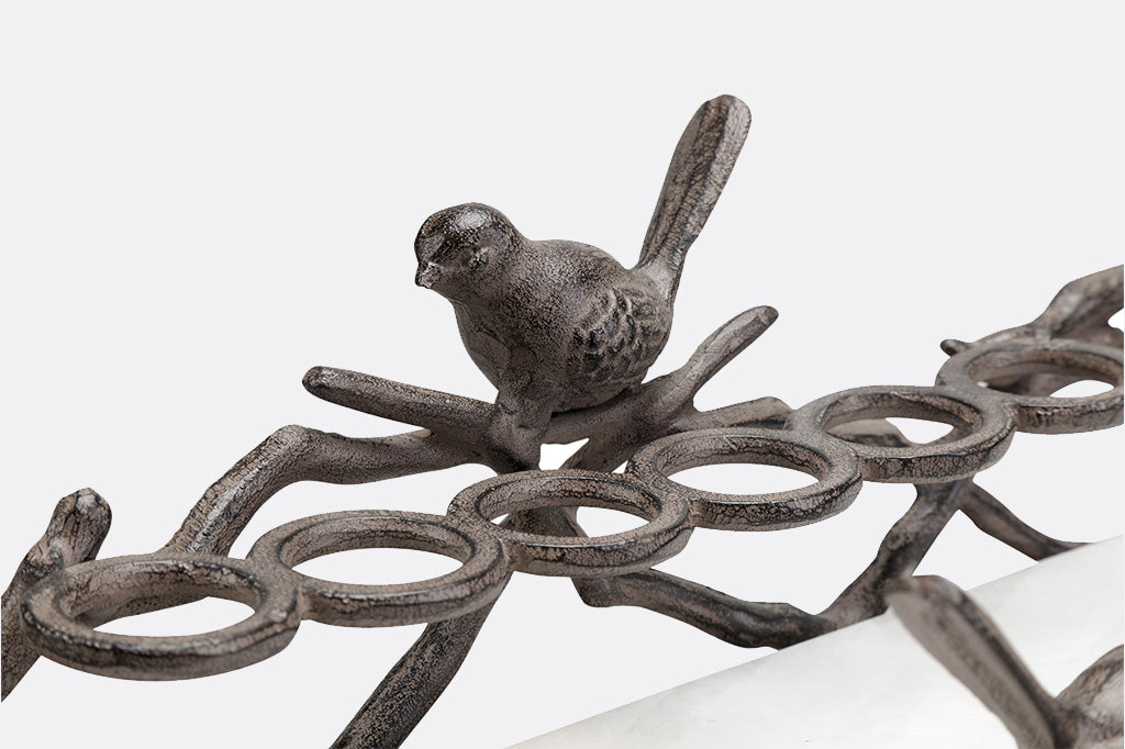 close up imagery of brindille bird sitting on branch