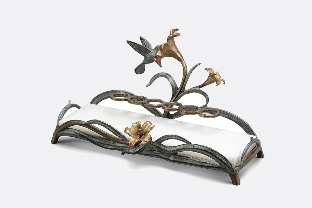 humming bird vanity tray featuring lipstick rings and a with white marble base side view