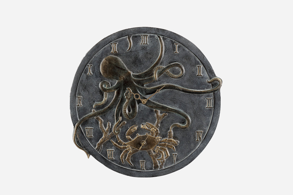 Cast metal clock and thermometer with octopus and crab detailing