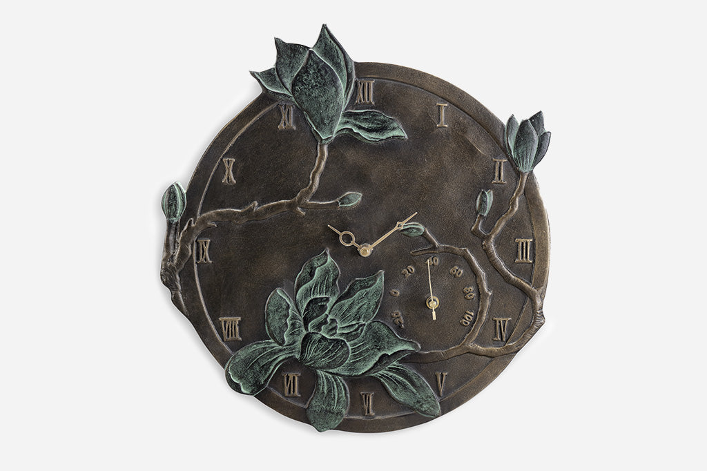 cast metal garden wall clock and thermometer