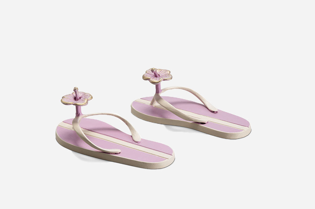 Light pink wall hook. Hook is a flip flop with flower accent #color_plum