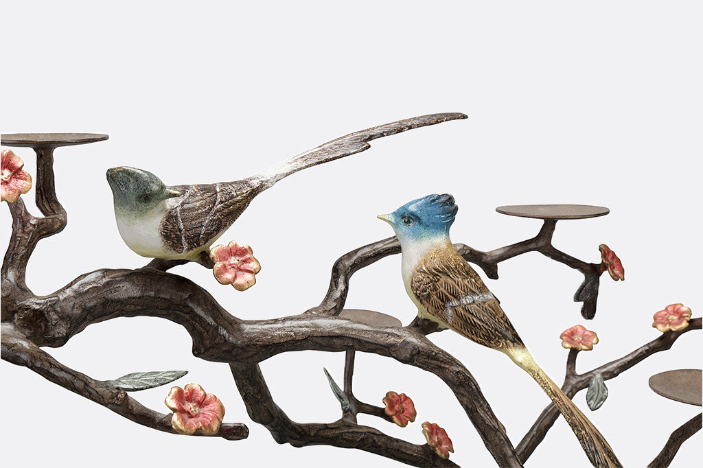 close up view of candelabra of two birds looking at each other